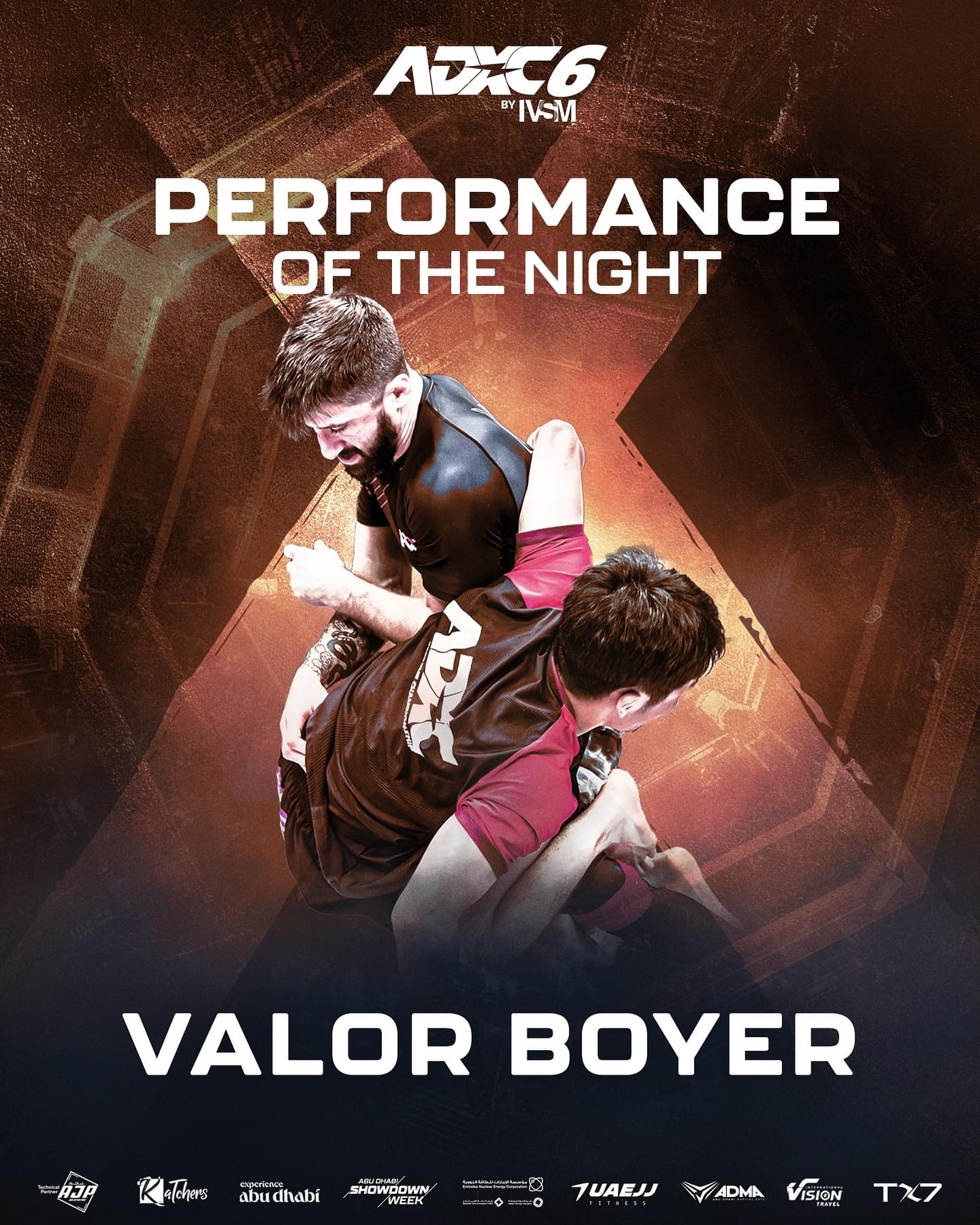 Two people engaged in a wrestling match, one in black and the other in red, with a dark background and text overlay.