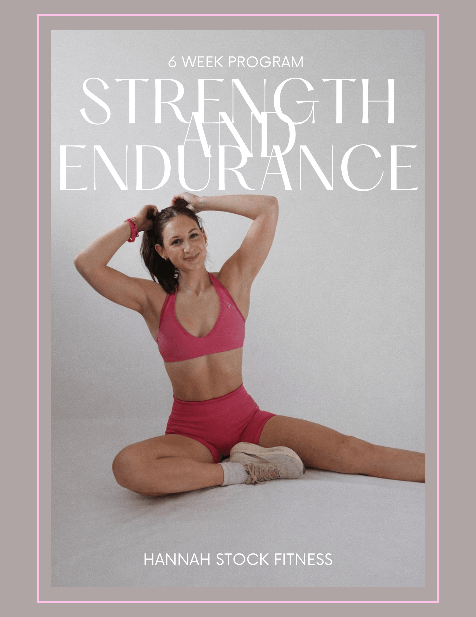 Woman in pink sportswear sitting on the floor with one leg extended and the other bent, smiling, against a plain background.
