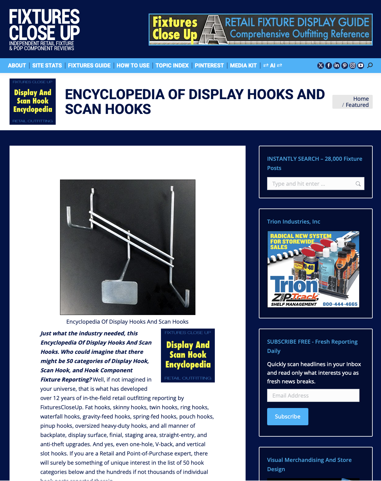 Black and white photo of display hooks and scan hooks on a dark background.