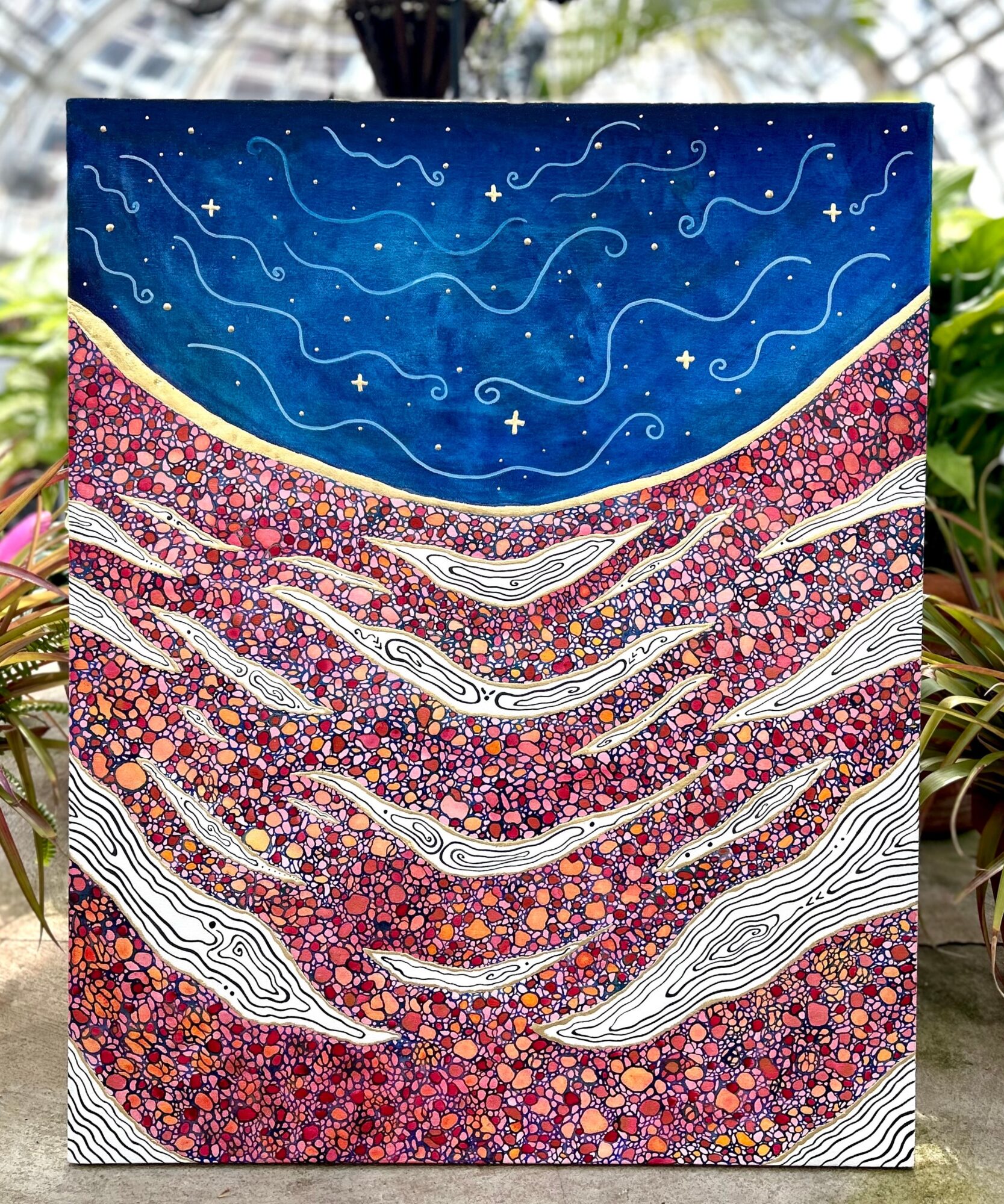 Colorful abstract painting with a blue sky, white stars, and swirling patterns over a vibrant, textured landscape.