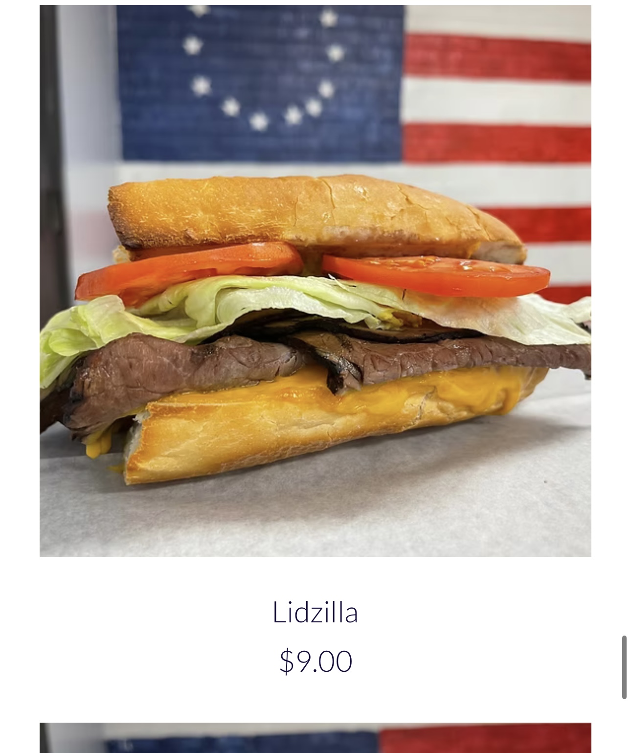A burger with lettuce, tomato, cheese, beef patty, and fried potato, with an American flag in the background.