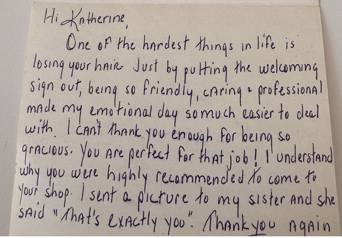 Handwritten note on paper expressing gratitude and encouragement, mentioning hair loss, professionalism, and appreciation for support.