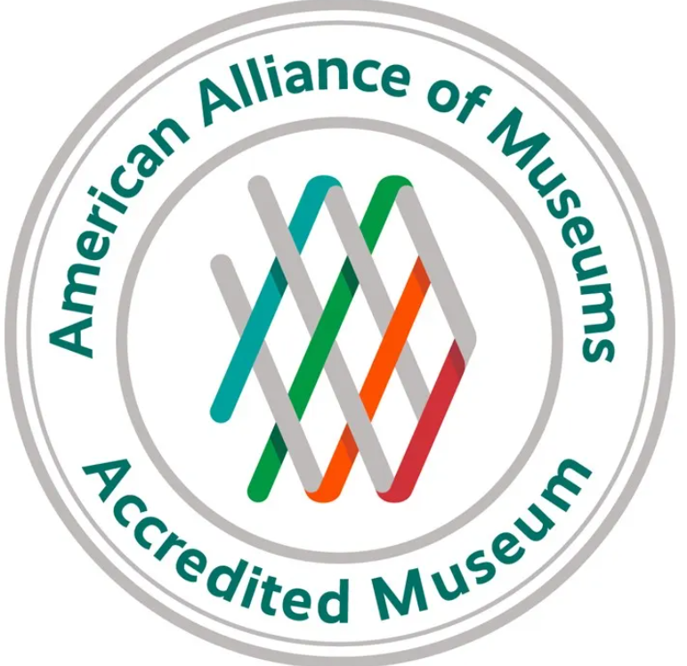 Logo with intertwined lines and text reading 'American Alliance of Museums Accredited Museum'.