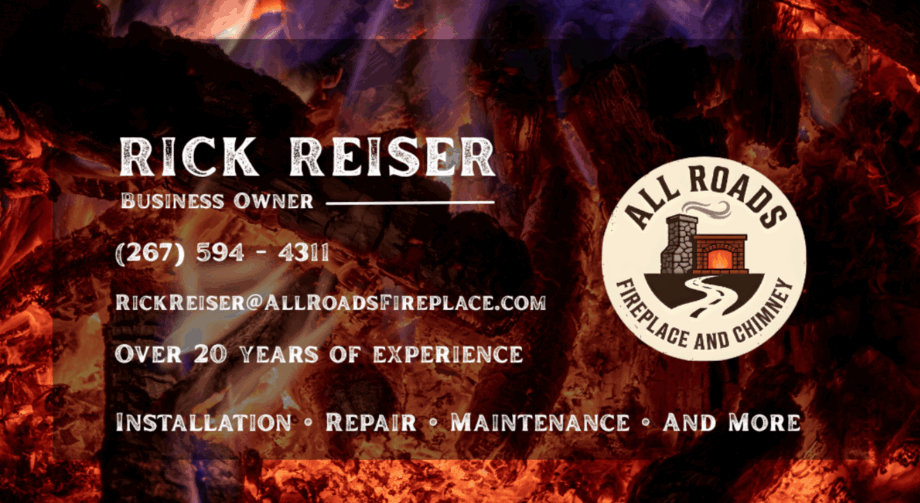 Business card with fiery background, Rick Reiser's name, contact info, and a logo with a road and mountain design.
