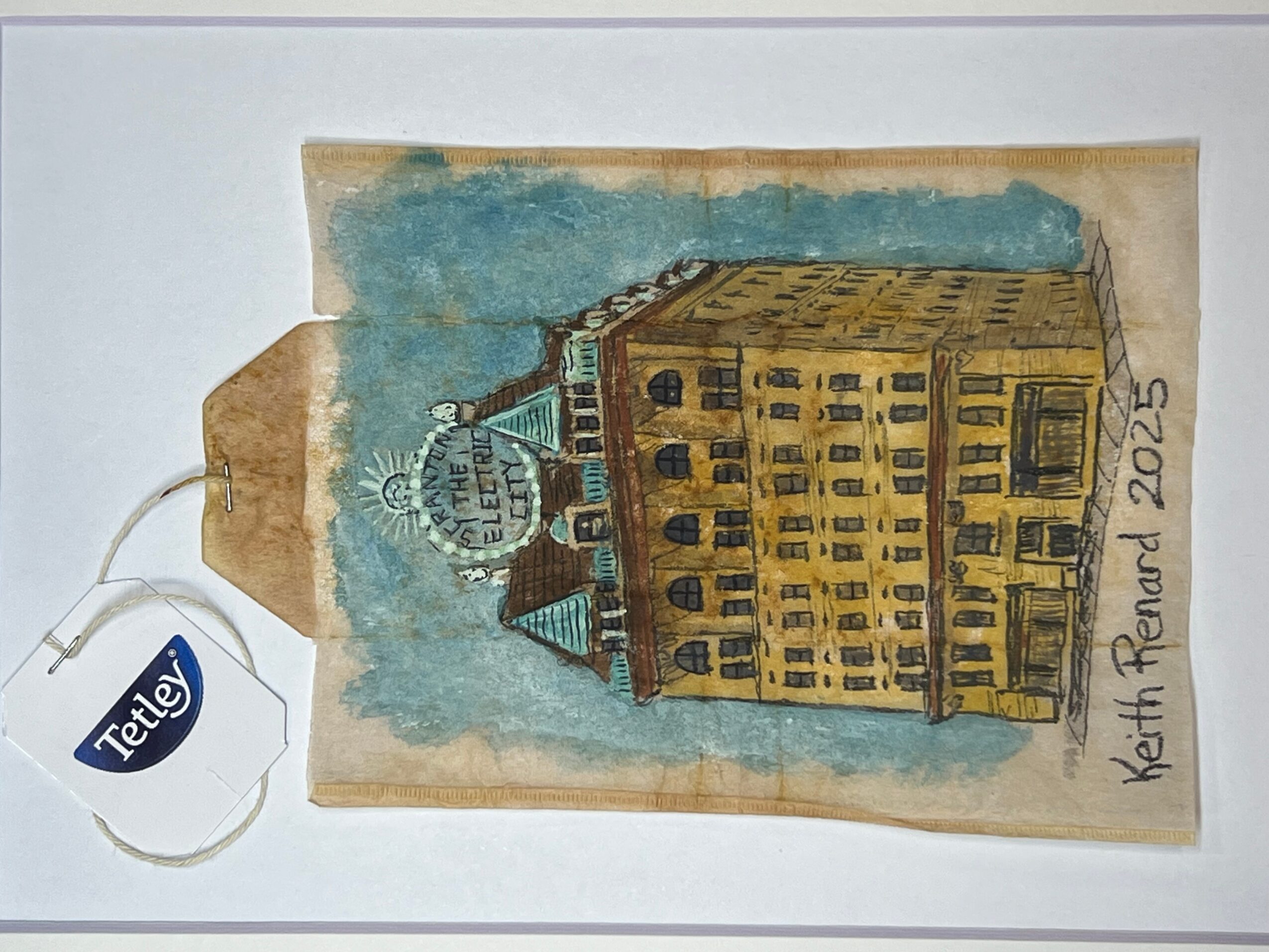 Drawing of a historic building with a dome, towers, and multiple windows, with handwritten text and a Tefl tag attached.