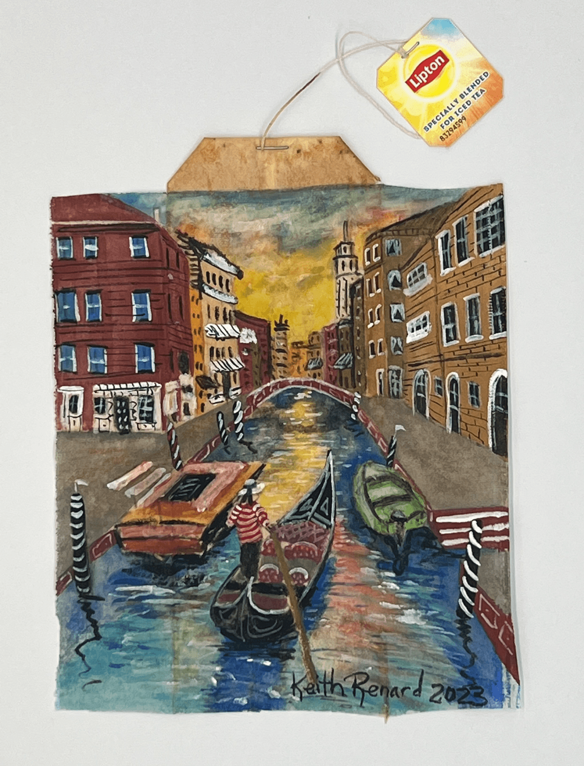 Colorful painting of a canal with boats, buildings on both sides, and a bridge in the background, signed by the artist.