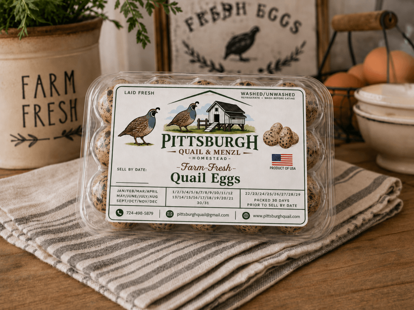 Clear plastic container of quail eggs on a striped cloth, with farm-themed decorations in the background.
