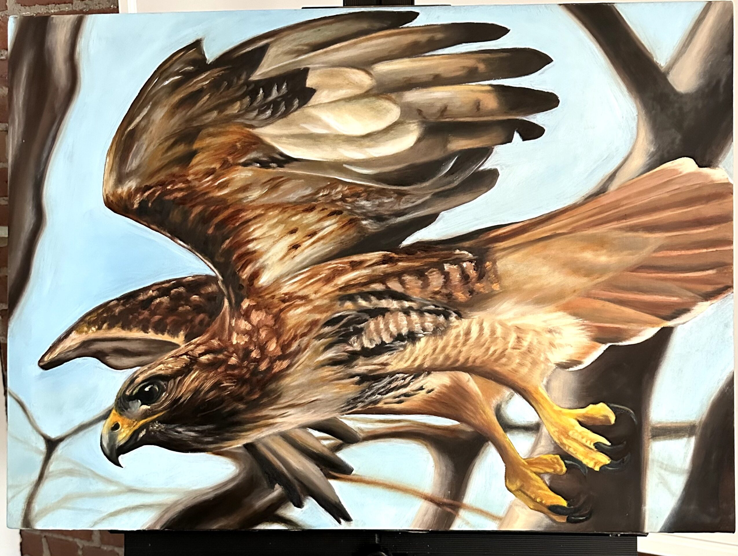 A detailed painting of a bird of prey perched on a branch, with brown and beige feathers and a sharp beak.