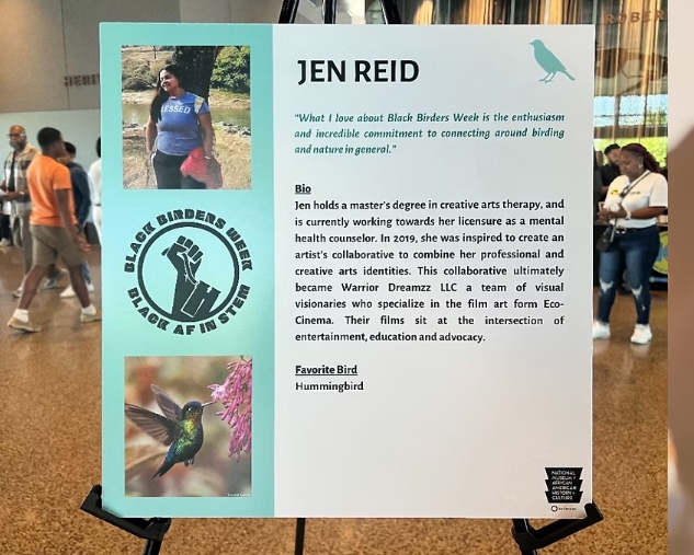 Information board about Jen Reid, including her photo, bio, and a hummingbird image, with a logo and text on a light blue background.
