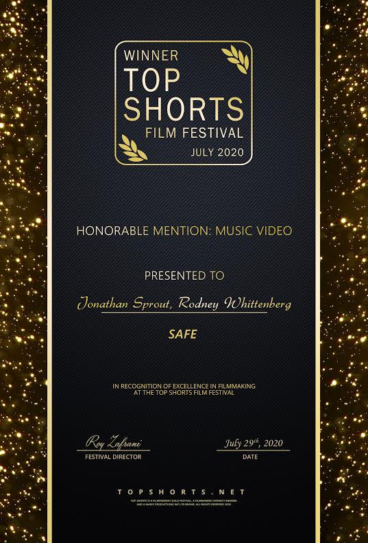 Award certificate for top shorts film festival, July 2020, honoring music video, presented to Jonathan Sproul and Rodney Whittenberg, signed by festival director.
