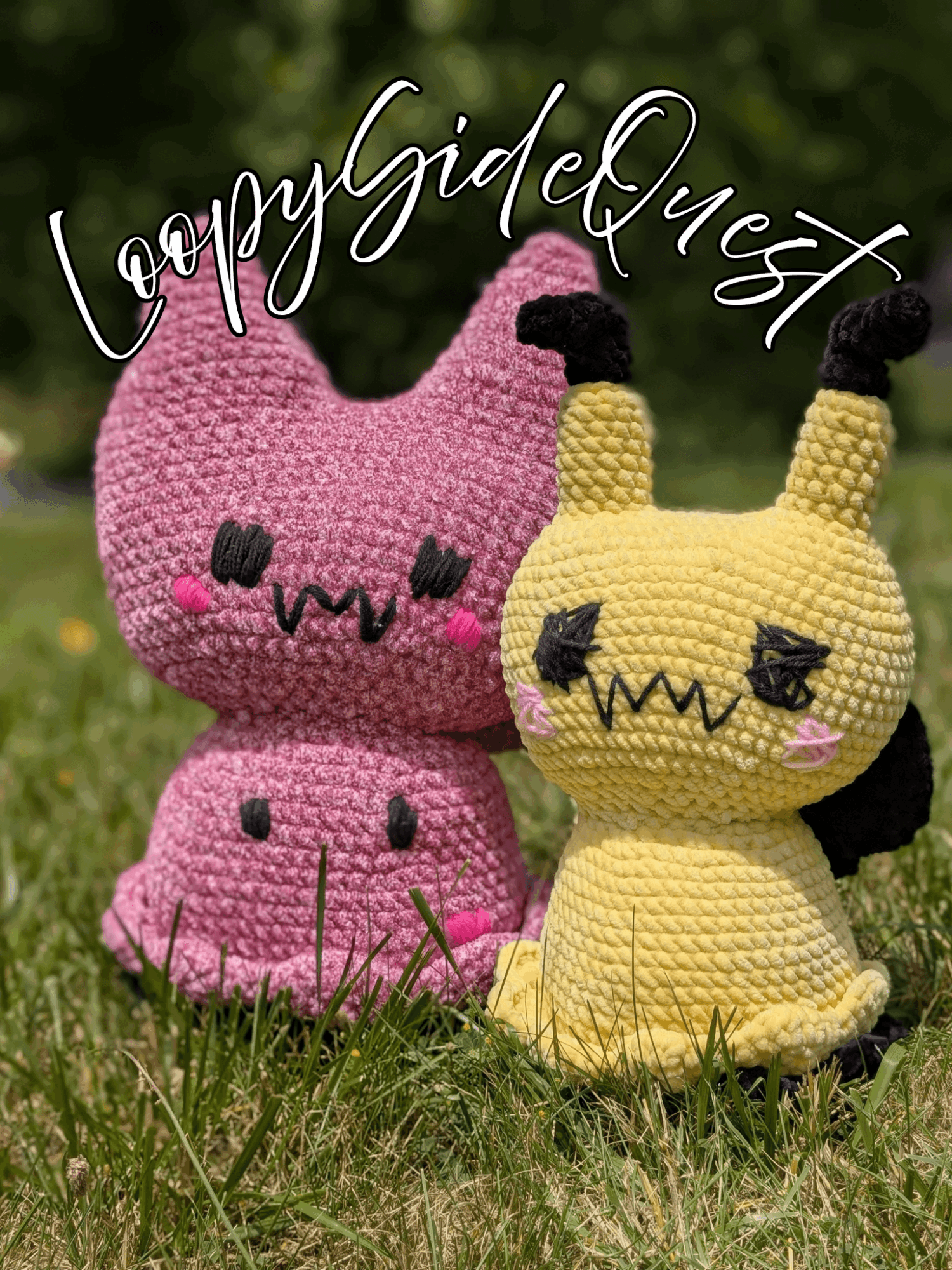 Two crocheted plush toys resembling animals, one pink and one yellow, with a grassy background and handwritten text above.