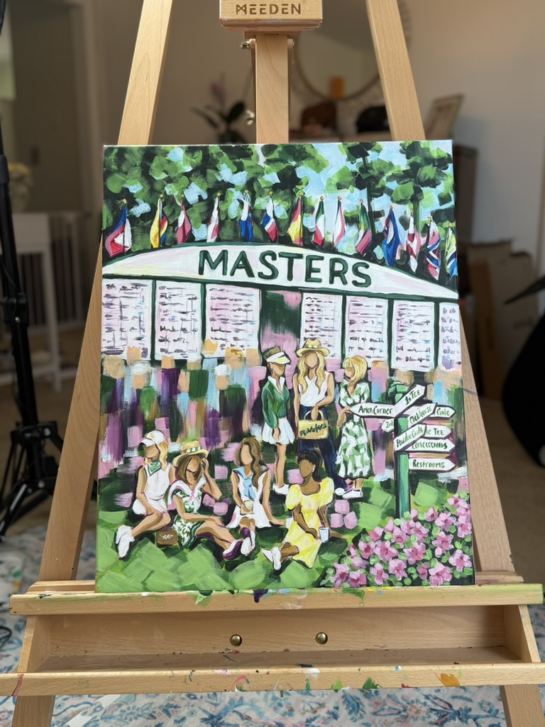 Colorful poster with children and a banner reading 'MASTERS' displayed on an easel.