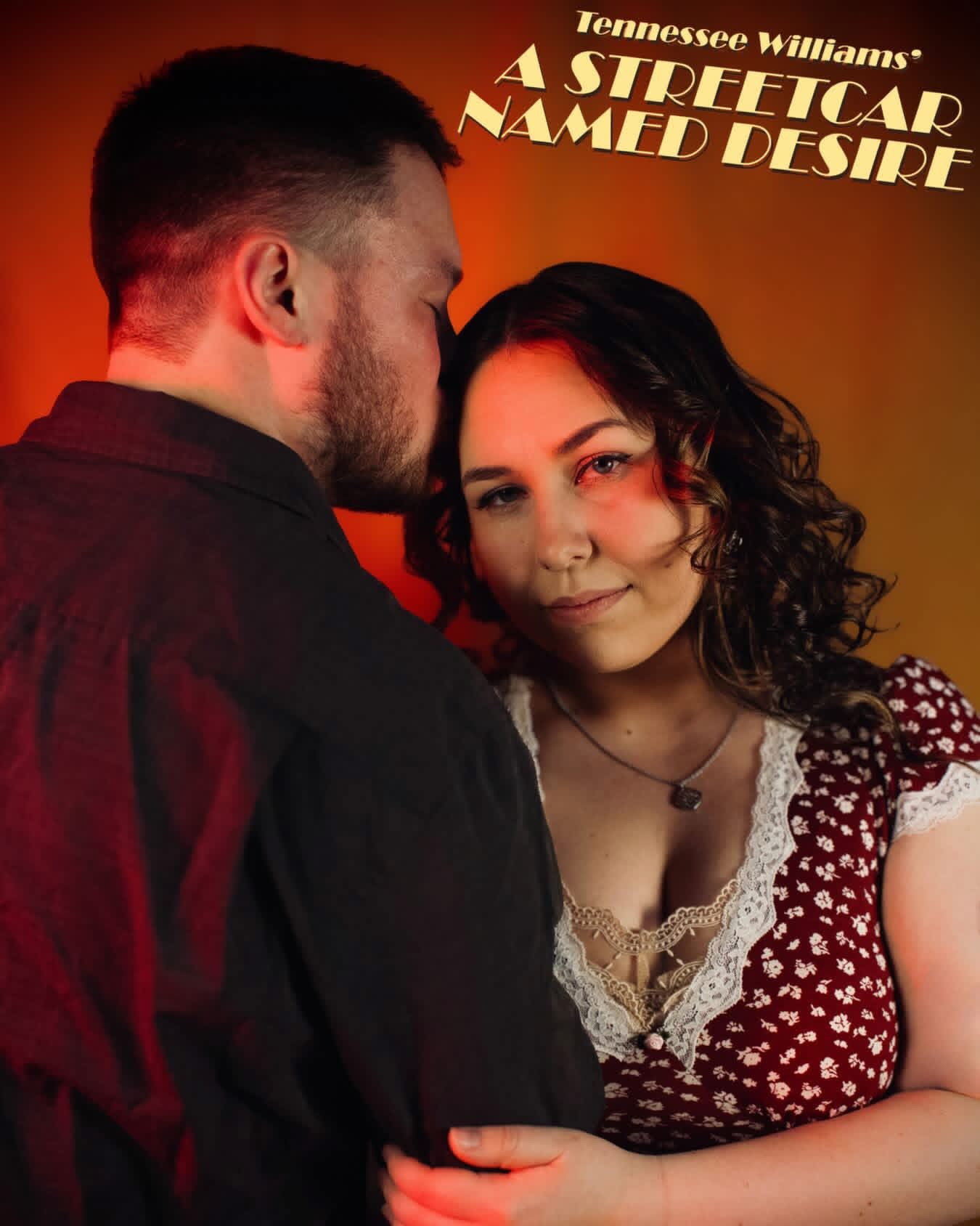 A man and woman face each other closely, with warm lighting and a blurred background, promoting Tennessee Williams' play.