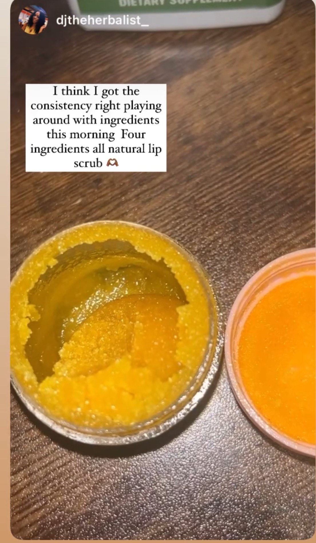 Open jar with yellow scrub and orange lid beside it on a wooden surface, with a text overlay about skincare ingredients.