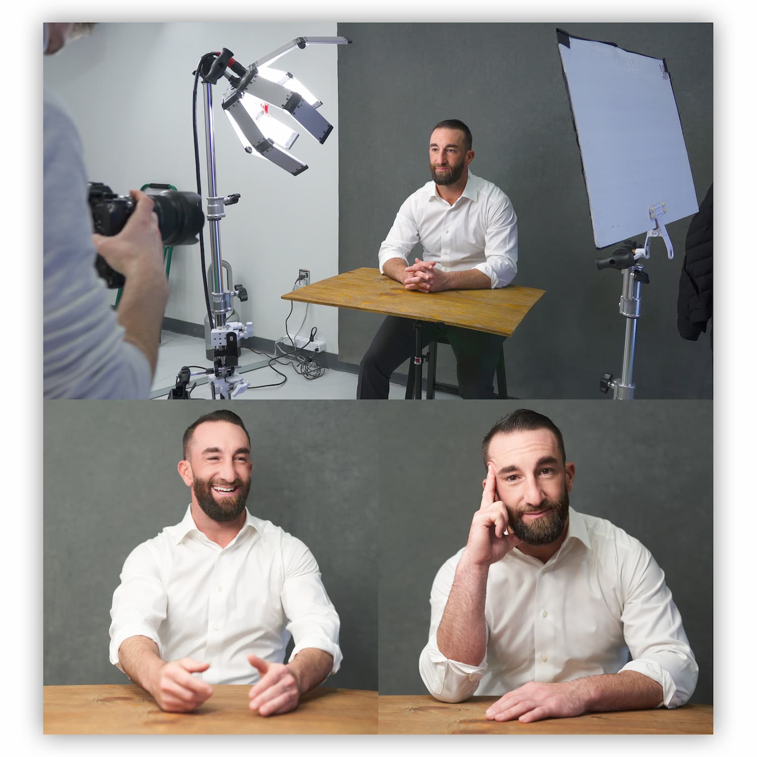 Man in white shirt sitting at a table during a photo shoot, with photography equipment and a gray backdrop.